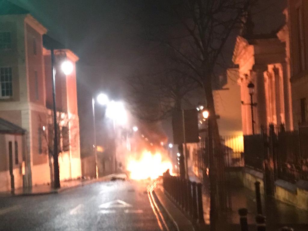 A handout released by the Police Service of Northern Ireland shows a burning car following a suspected car bomb in Londonderry, Northern Ireland.