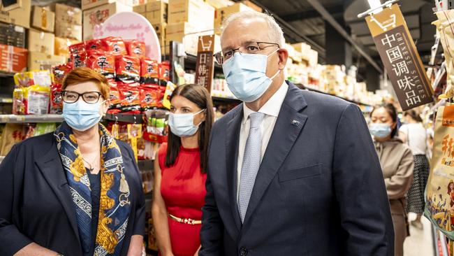 Scott Morrison and Marise Payne, left, in Burwood, inner-west Sydney, on Wednesday. Picture: Darren Leigh Roberts