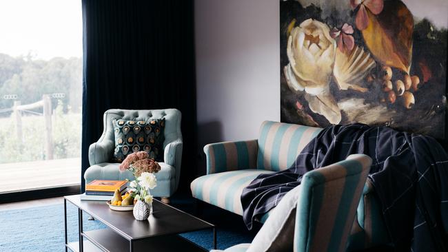 Plush furnishings and striking artworks dominate the decor.