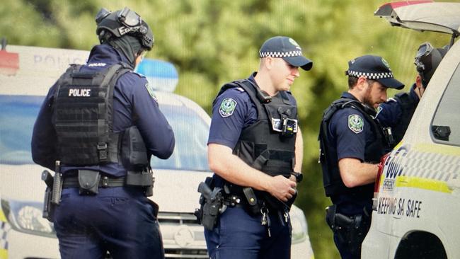 Armed police at the scene of the three-hour siege at Elwood Road, MacDonald Park. Picture: Tait Schmaal