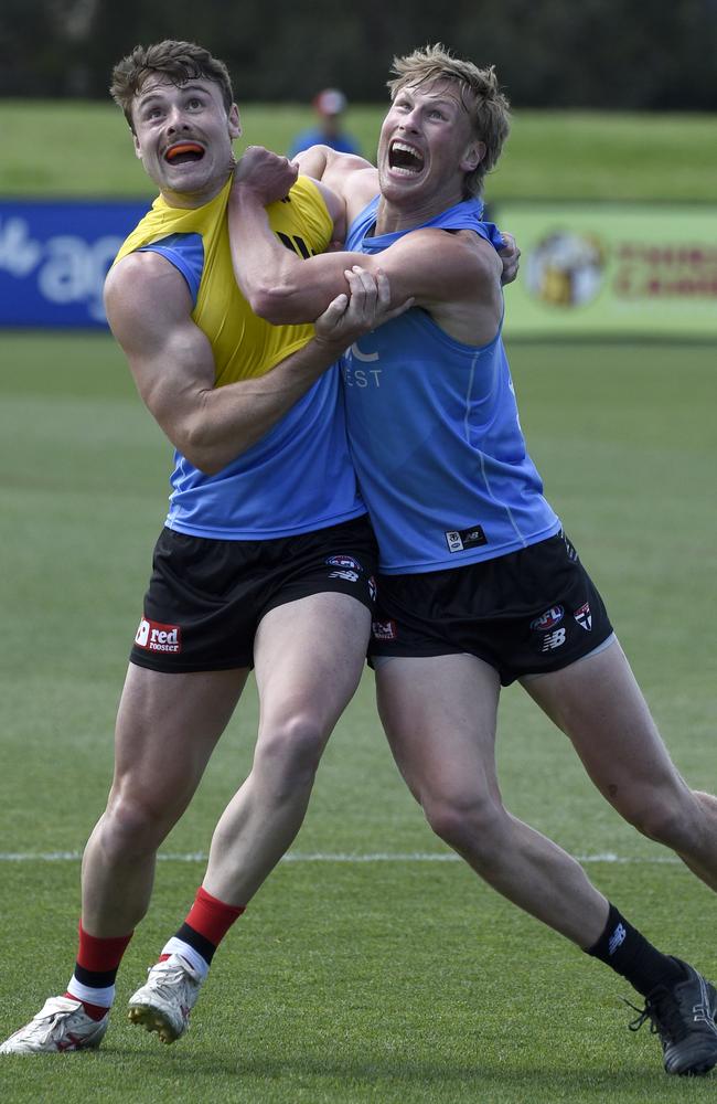 Harry Boyd and Max Heath go head-to-head at St Kilda training. Picture: Andrew Henshaw