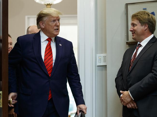 President Donald Trump arrives for an event on "transparency in Federal guidance and enforcement" in the Roosevelt Room of the White House, Wednesday, Oct. 9, 2019, in Washington. (AP Photo/Evan Vucci)