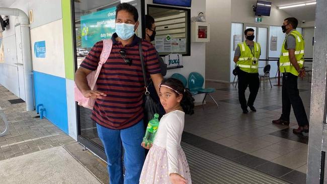 Nadesalingam “Nades” Murugappan and daughter Kopika prepare to leave Christmas Island on Tuesday.