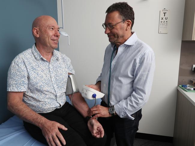 Melbourne GP Dr Martin Fox with patient mark Thomas at Southbank. 