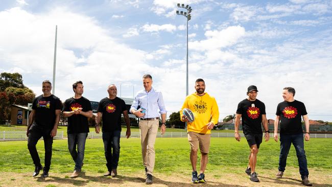 Dale Agius, Gavin Wanganeen, Michael Long, South Australian Premier Peter Malinauskas, Dean Parkin, Andrew McLeod and Minister for Health and Aged Care, Mark Butler at a doorstep in support of an Indigenous Voice to Parliament at Thiem Kia Oval, Woodville/ Kaurna Yarta on Saturday, October 7, 2023. Picture: The Advertiser/ Morgan Sette