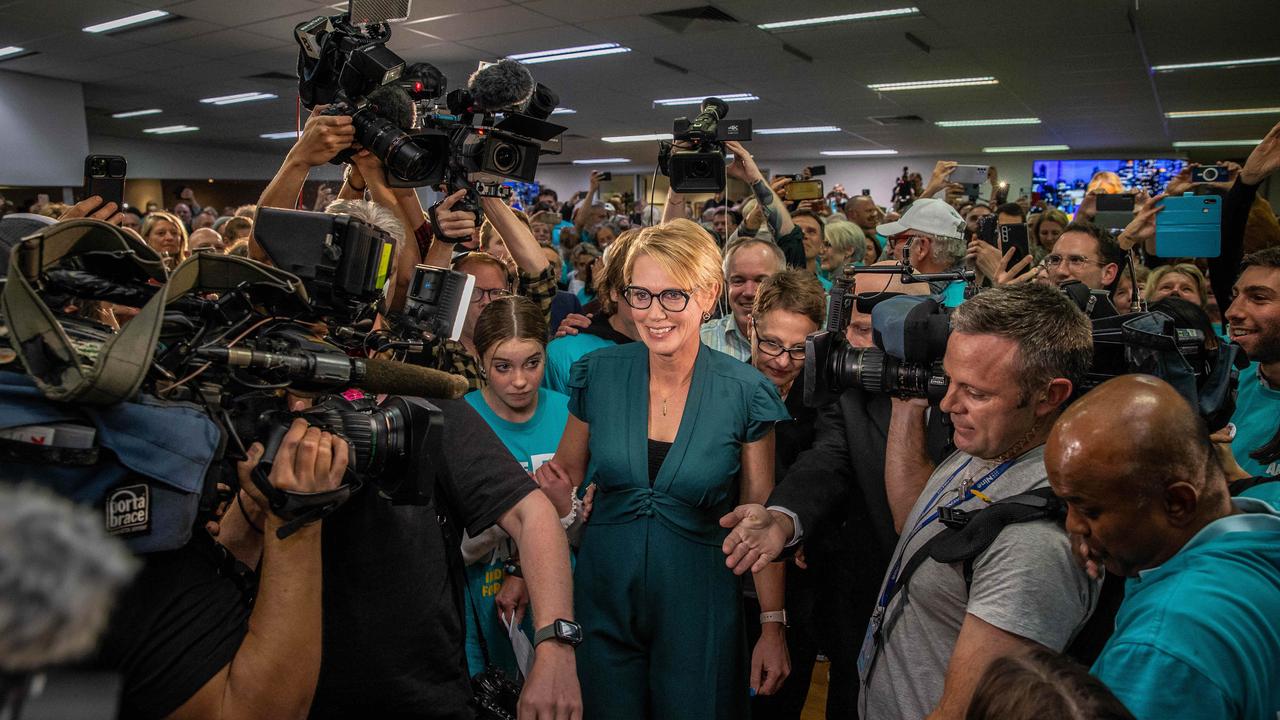 Independent Zoe Daniel surrounded be media after claiming victory in the seat of Goldstein. Picture: Jake Nowakowski