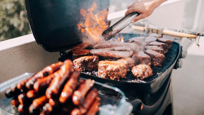 A discussion about buying real estate is as much a part of a family barbecue as a pile of freshly cooked snags. (Pic: iStock)