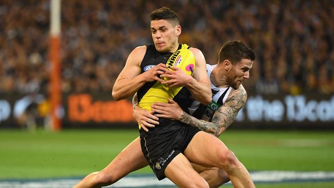 Dion Prestia is tackled by Jeremy Howe. Picture: Getty Images