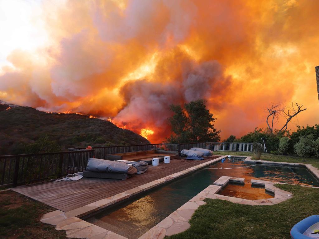 Winds expected to reach 160km/h have fanned the blaze which has forced around 30,000 residents to evacuate their homes. Picture: David Swanson / AFP)