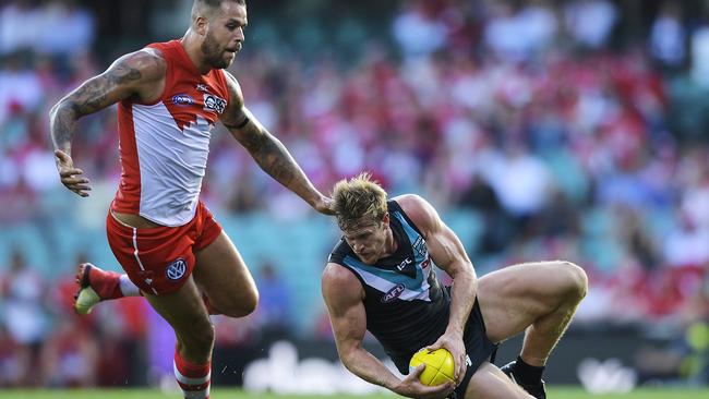 The Power’s Tom Jonas against Lance Franklin in April. Jonas has been one of the Power’s star performers this year. Picture: Brett Hemmings/AFL Media/Getty Images