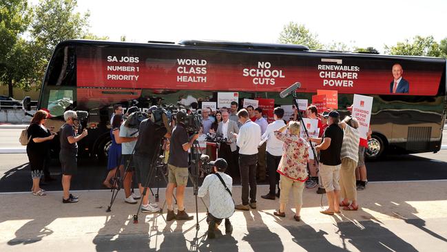 Premier Jay Weatherill holds a press conference in front of his bus. Picture: Dylan Coker