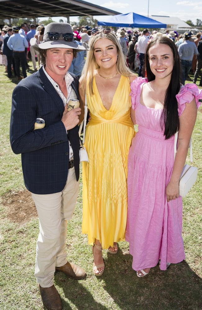 At the Clifton Races are (from left) Will Denny, Caitlin Fogarty and Emma Morris, Saturday, October 28, 2023. Picture: Kevin Farmer