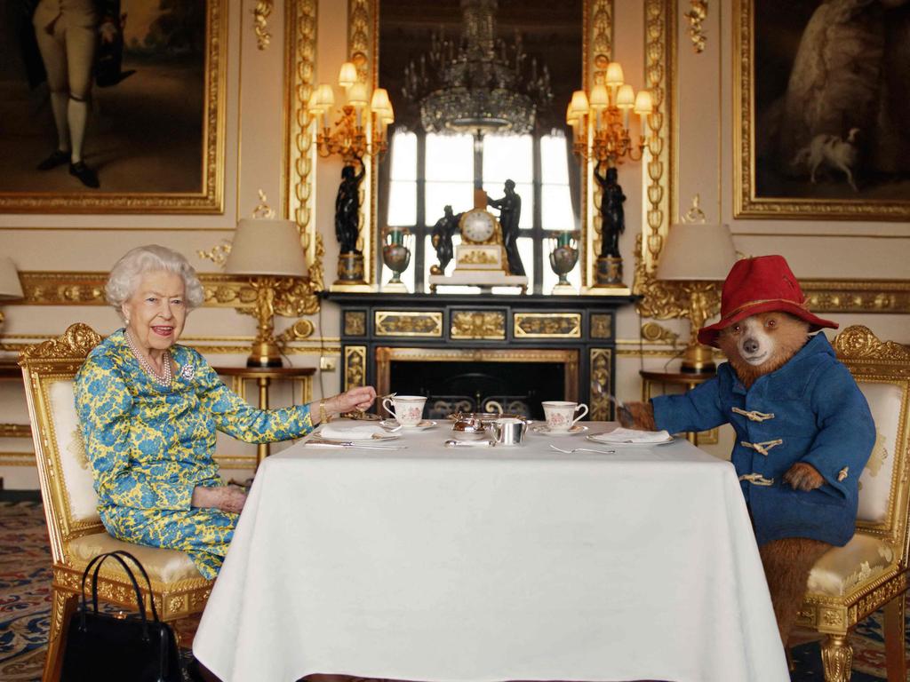 Queen Elizabeth II and Paddington Bear having cream tea at Buckingham Palace, taken from a film that was shown at the BBC Platinum Party at the Palace on June 4, 2022. Picture: AFP