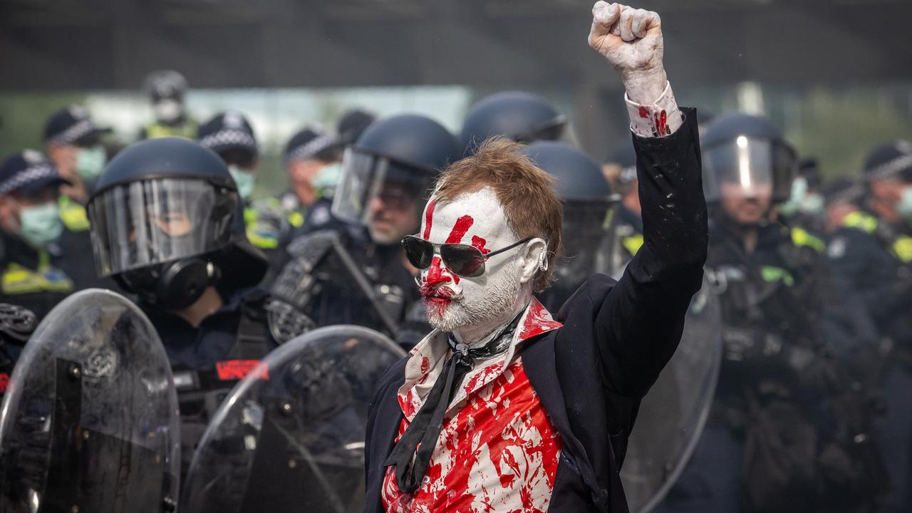 Anti-war activists protest the Land Forces 2024 International Land Defence Exposition at the Melbourne Convention and Exhibition Centre. Picture: Jake Nowakowski