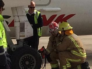 Qantas aborts landing in wheel drama