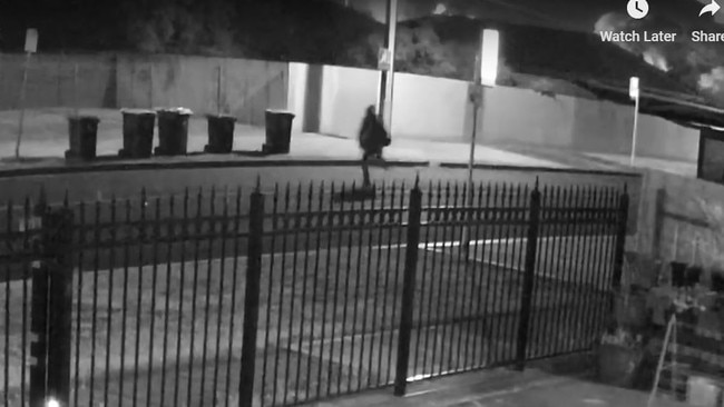 New CCTV footage captured two men of African appearance running towards a red Falcon XR6 ute parked at Woodville Gardens in November last year.