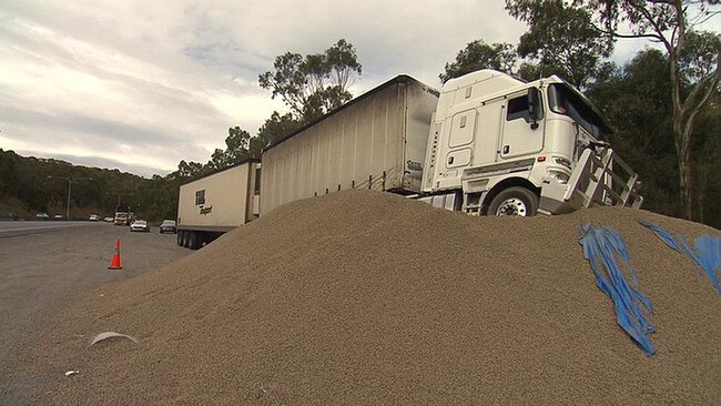 A truckie ploughed into a pile of gravel near the Heysen Tunnels on the South-Eastern Adelaide freeway. Picture: 7 News Adelaide