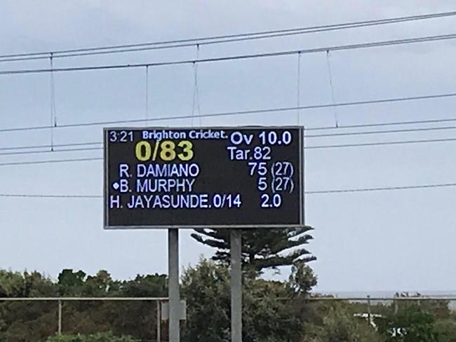 The scoreboard tells the tale at Brighton Beach Oval.