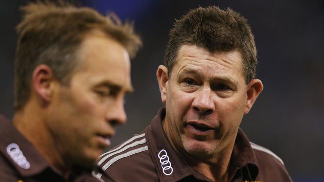 MELBOURNE, AUSTRALIA - APRIL 10:  Hawks head coach Alastair Clarkson (L) walks off after quarter time with assistant coach Brett Ratten during the round three AFL match between the Western Bulldogs and the Hawthorn Hawks at Etihad Stadium on April 10, 2016 in Melbourne, Australia.  (Photo by Michael Dodge/Getty Images)