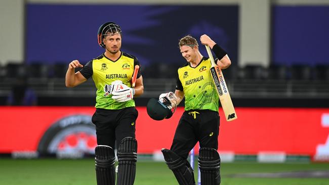 DUBAI, UNITED ARAB EMIRATES – OCTOBER 28: Marcus Stoinis and Steven Smith of Australia celebrate following the ICC Men's T20 World Cup match between Australia and Sri Lanka at Dubai International Stadium on October 28, 2021 in Dubai, United Arab Emirates. (Photo by Alex Davidson/Getty Images)