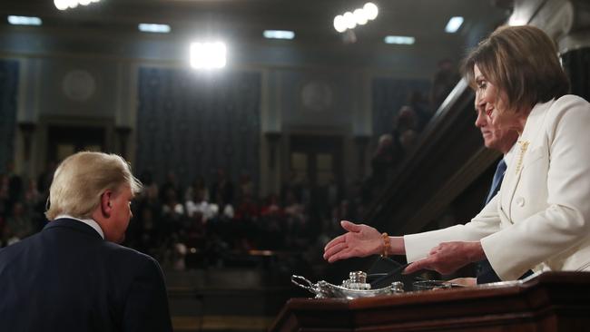 The moment when President Donald Trump failed to shake Nancy Pelosi’s hand. Picture: Leah Millis