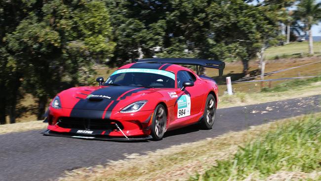 John Ireland and Janet Binns throw sparks out the back of their Dodge Viper ACR on the Theresa Creek stage of the Targa Great Barrier Reef. PICTURE: BRENDAN RADKE.