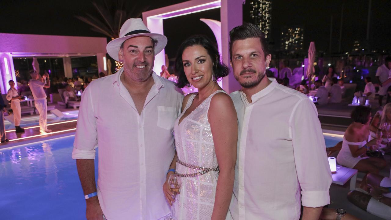 Jason Smith, Becs Perone, Dan Perone at La Luna Beach Club on New Year's Eve, (for the Pulse). Picture: Marcelo Lang