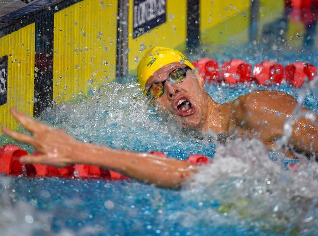 Mitch Larkin touches first in the 200m IM for his fourth gold medal. Picture: AFP