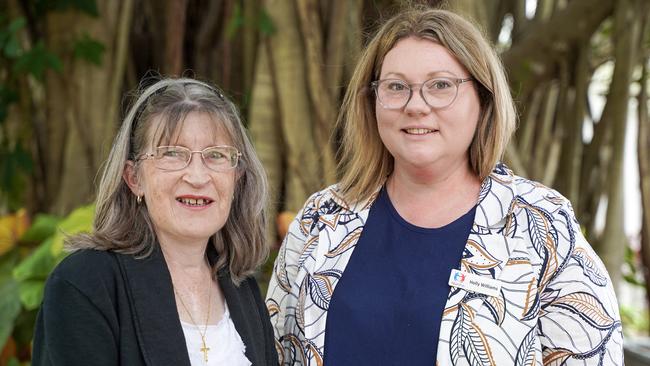 Congenital heart disease survivor Melody Burton, of Mackay, with Heart Kids state manager Holly Williams, after receiving a cheque for $44,508 from the Mayor's Charity Ball fundraiser. Picture: Heidi Petith