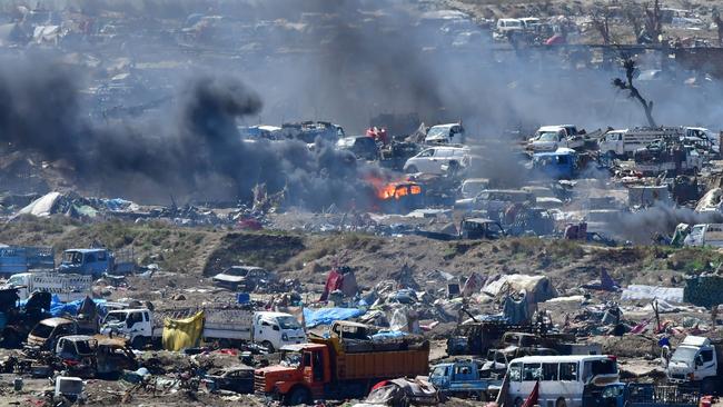 Smoke rises from the Islamic State group's last remaining position in the village of Baghouz during battles with the Syrian Democratic Forces in 2019. Picture: Giuseppe Cacace/AFP)