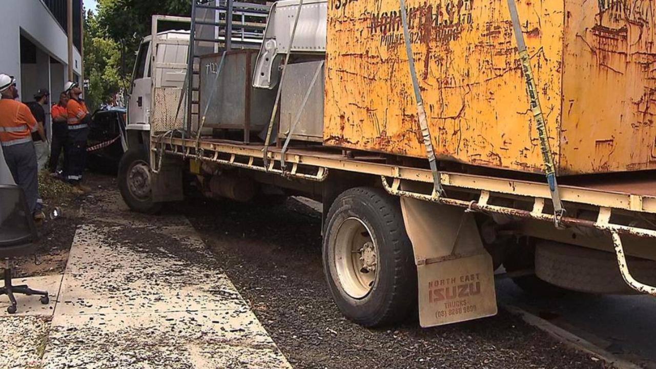 Trail of destruction as truck smashes into cars outside gym