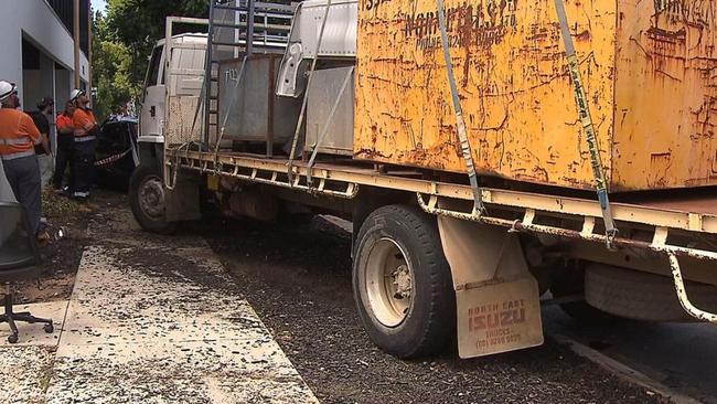 An out-of-control truck has left a trail of destruction outside a popular gym at Alberton. The vehicle ploughed into parked cars when the driver suffered a medical episode. Picture: 7NEWS