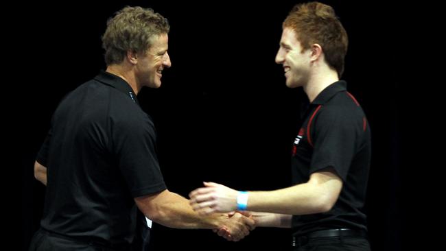 Damien Hardwick welcomes Reece Conca to Richmond at the 2010 AFL Draft. 