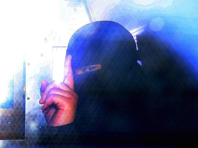 Alo-Bridget Namoa arrives at Fairfield police station on Tuesday / Picture: Richard Dobson