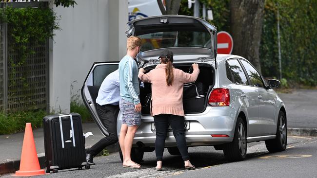 South African player Heinrich Klaasen packs his kit bags into a car at the team hotel after an announcement that the tour has been abandoned. Picture: Getty Images