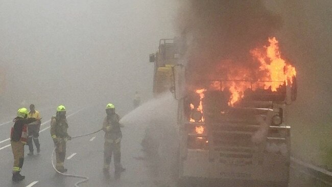 Fire and Rescue NSW crews extinguish a semi-trailer on fire at Clyde Mountain. Picture: Fire and Rescue NSW