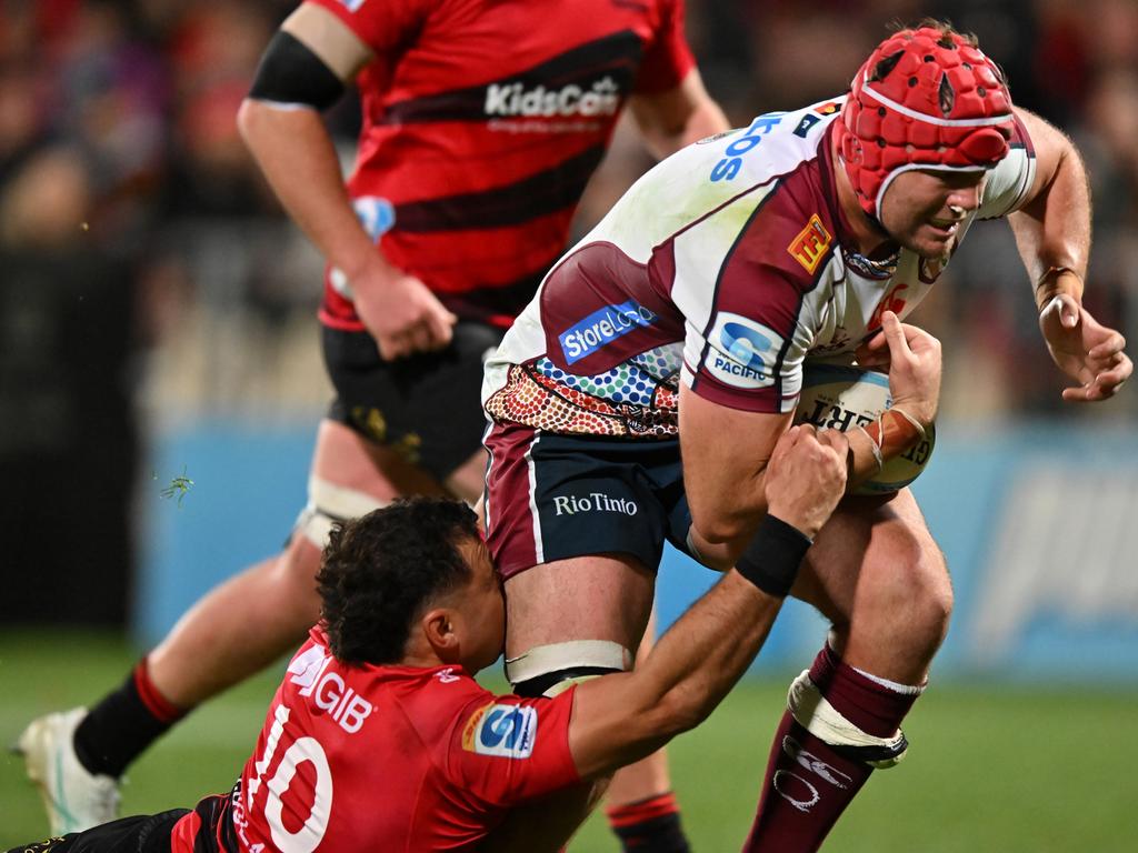 Harry Wilson charges through the Crusaders defence to score a try for Queensland last season. Picture: Kai Schwoerer/Getty Images