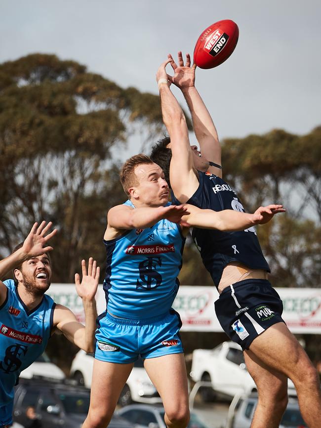 Sturt's Mark Evans and South's Jake Summerton contest at Noarlunga Oval on Sunday. Picture: AAP Image/MATT LOXTON