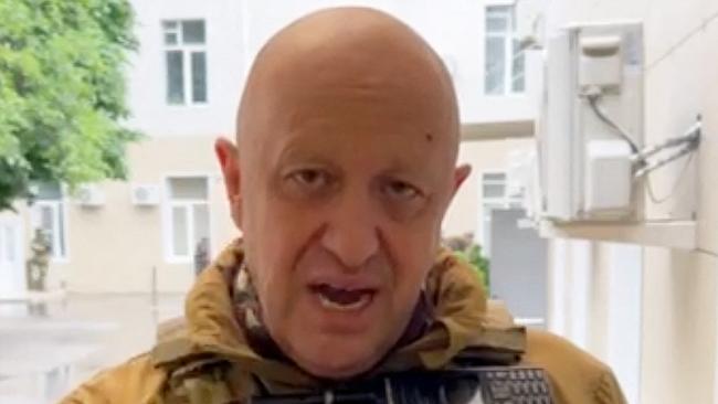 (FILES) This video grab taken from handout footage posted on June 24, 2023 on the Telegram account of the press service of Concord -- a company linked to the chief of Russian mercenary group Wagner, Yevgeny Prigozhin -- shows Yevgeny Prigozhin speaking inside the headquarters of the Russian southern military district in the city of Rostov-on-Don. Wagner chief Yevgeny Prigozhin is still in Russia, Belarus's president said on July 6, 2023, despite a deal with the Kremlin for him to move to Belarus following his failed insurrection last month. (Photo by Handout / TELEGRAM/ @concordgroup_official / AFP) / RESTRICTED TO EDITORIAL USE - MANDATORY CREDIT 