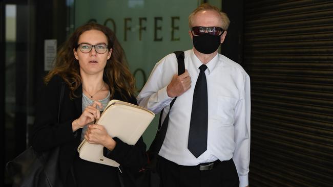 Roy Stanton leaves Downing Centre Court with his lawyer. Picture: NCA NewsWire/Joel Carrett