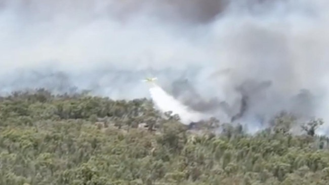 Water bombers have been brought in to try to stop the blaze. Picture: RFS