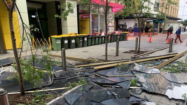 Smashed windows from the building in Gawler Place, CBD. Picture: Kitty Barr