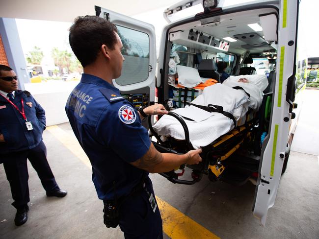 Mr Payne arrives with patient at Bankstown Hospital. Picture: Luke Drew