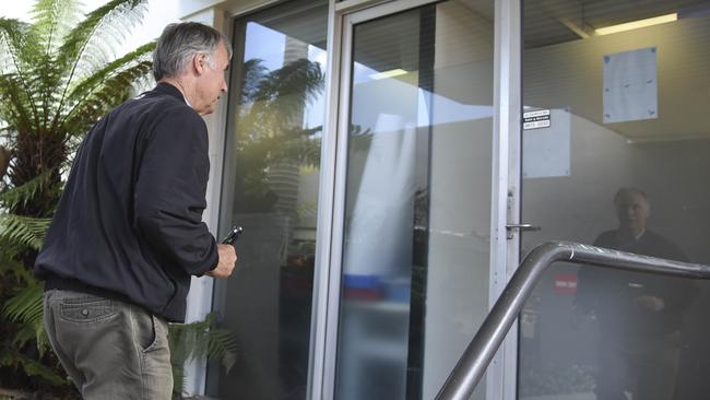 MP John Alexander, Member for Bennelong, arriving at his office.