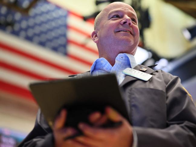 NEW YORK, NEW YORK - MAY 12: Traders work on the floor of the New York Stock Exchange during morning trading on May 12, 2025 in New York City. All three major stock indexes rallied at the opening of the stock market with the Dow Jones leading the way opening up over 1,000 points after the U.S. and China agreed to cut âreciprocalâ tariffs by 115% for 90 days during ongoing negotiations.   Michael M. Santiago/Getty Images/AFP (Photo by Michael M. Santiago / GETTY IMAGES NORTH AMERICA / Getty Images via AFP)
