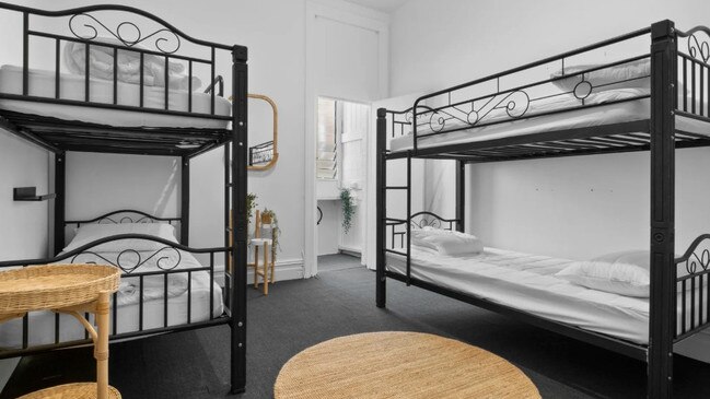 A Potts Point share house has four beds in one room.