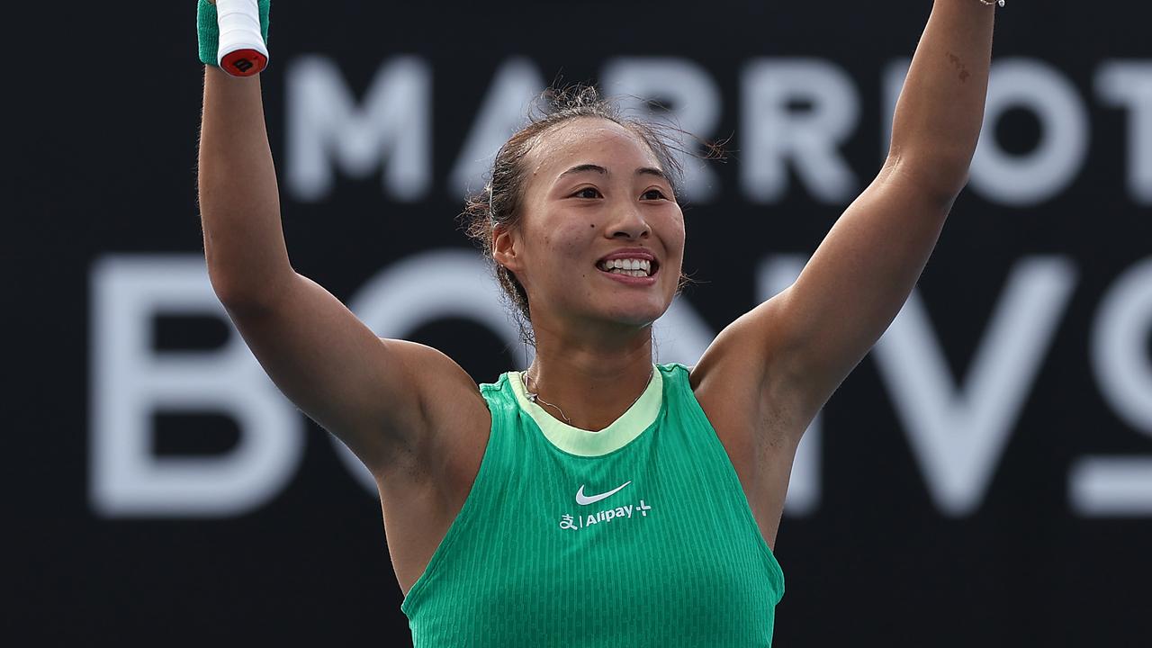 MELBOURNE, AUSTRALIA - JANUARY 18: Qinwen Zheng of China celebrates match point in their round two singles match against Katie Boulter of Great Britain during the 2024 Australian Open at Melbourne Park on January 18, 2024 in Melbourne, Australia. (Photo by Julian Finney/Getty Images)