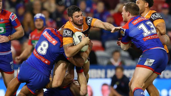 NEWCASTLE, AUSTRALIA - JUNE 29: Matt Gillett of the Brisbane Broncos is tackled during the round 15 NRL match between the Newcastle Knights and the Brisbane Broncos at McDonald Jones Stadium on June 29, 2019 in Newcastle, Australia. (Photo by Tony Feder/Getty Images)