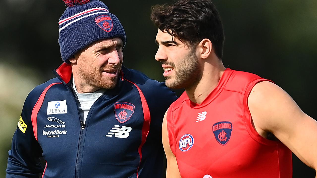 Christian Petracca and head coach Simon Goodwin work on the small confines of Gosch's Paddock. Picture: Getty Images