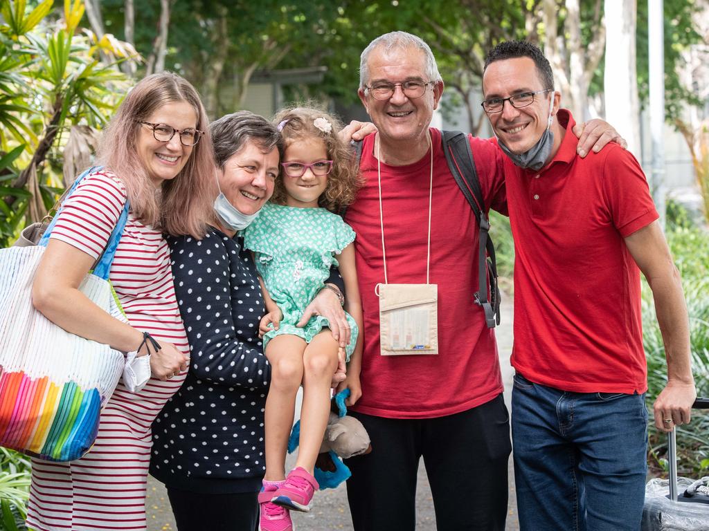 Zsofi Nemeth, Julianna Nemeth, Lili Kaity, 5, Rudolf Nemeth and David Kaity at Brisbane International airport as borders re-open. Picture: Brad Fleet